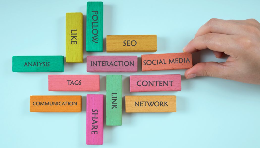 Picture of tiles with social media prompts on